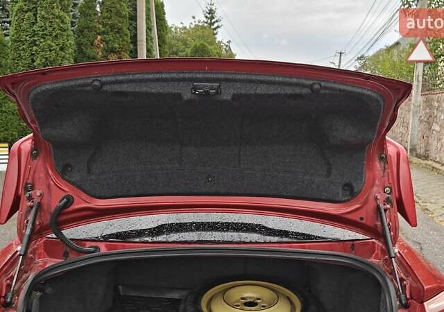 Червоний Міцубісі Lancer, об'ємом двигуна 2 л та пробігом 186 тис. км за 5600 $, фото 19 на Automoto.ua