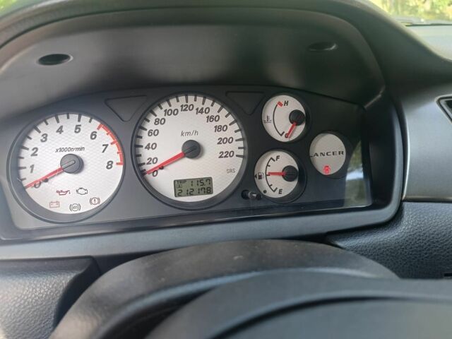 Красный Мицубиси Лансер, объемом двигателя 0 л и пробегом 221 тыс. км за 5500 $, фото 6 на Automoto.ua