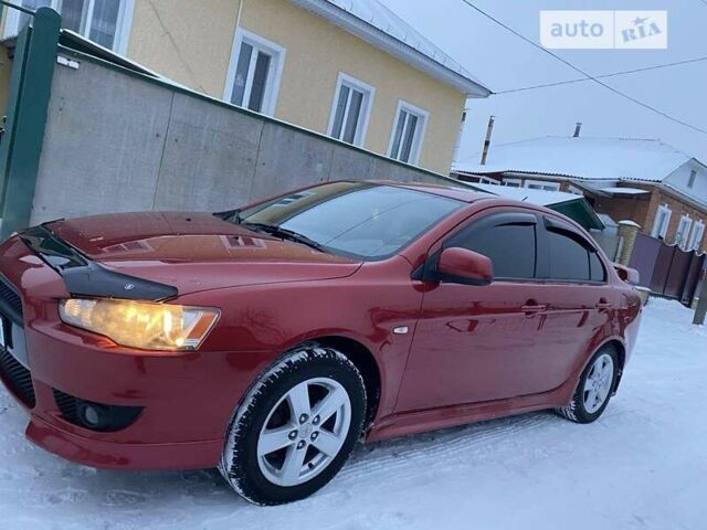 Червоний Міцубісі Lancer, об'ємом двигуна 2 л та пробігом 171 тис. км за 7500 $, фото 10 на Automoto.ua