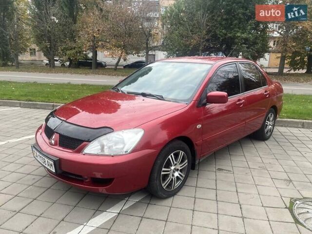 Красный Мицубиси Лансер, объемом двигателя 0 л и пробегом 282 тыс. км за 5200 $, фото 3 на Automoto.ua