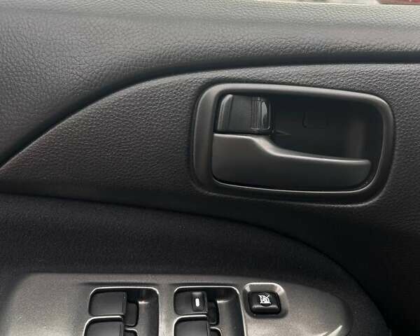 Красный Мицубиси Лансер, объемом двигателя 1.6 л и пробегом 176 тыс. км за 4300 $, фото 17 на Automoto.ua