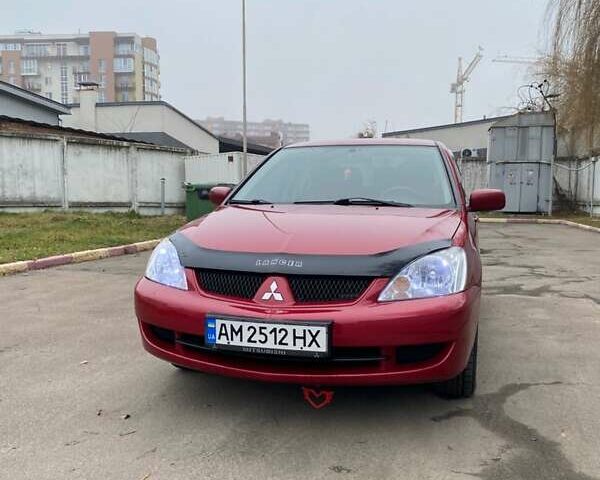 Червоний Міцубісі Lancer, об'ємом двигуна 1.58 л та пробігом 151 тис. км за 5600 $, фото 1 на Automoto.ua