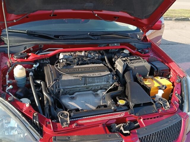 Червоний Міцубісі Lancer, об'ємом двигуна 2 л та пробігом 163 тис. км за 5500 $, фото 6 на Automoto.ua