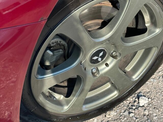 Красный Мицубиси Лансер, объемом двигателя 1.6 л и пробегом 230 тыс. км за 5300 $, фото 2 на Automoto.ua