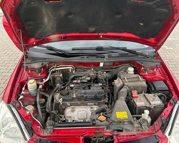 Красный Мицубиси Лансер, объемом двигателя 1.6 л и пробегом 176 тыс. км за 4300 $, фото 9 на Automoto.ua