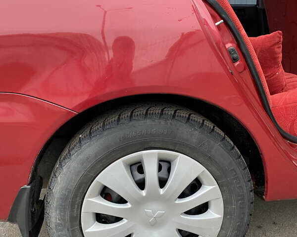 Червоний Міцубісі Lancer, об'ємом двигуна 1.58 л та пробігом 151 тис. км за 5600 $, фото 21 на Automoto.ua