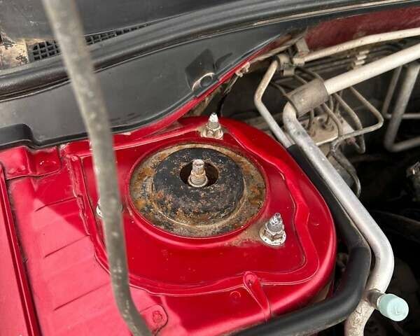 Красный Мицубиси Лансер, объемом двигателя 1.6 л и пробегом 176 тыс. км за 4300 $, фото 7 на Automoto.ua