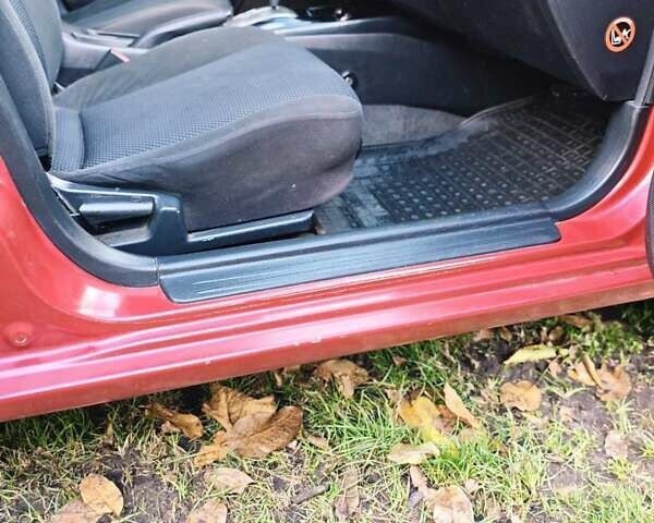 Красный Мицубиси Лансер, объемом двигателя 1.6 л и пробегом 214 тыс. км за 5000 $, фото 14 на Automoto.ua