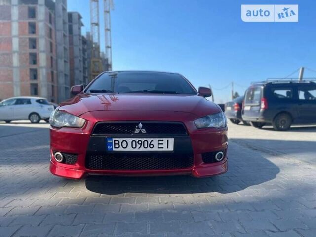 Червоний Міцубісі Lancer, об'ємом двигуна 2 л та пробігом 293 тис. км за 7350 $, фото 2 на Automoto.ua