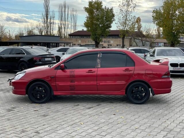Мицубиси Лансер 2007 в Кривом Роге на Automoto.ua Красный Мицубиси Лансер, объемом двигателя 1.6 л и пробегом 252 тыс. км за 5400 $, фото 3 на Automoto.ua