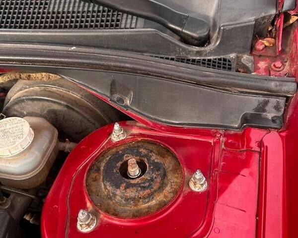 Красный Мицубиси Лансер, объемом двигателя 1.6 л и пробегом 176 тыс. км за 4300 $, фото 8 на Automoto.ua