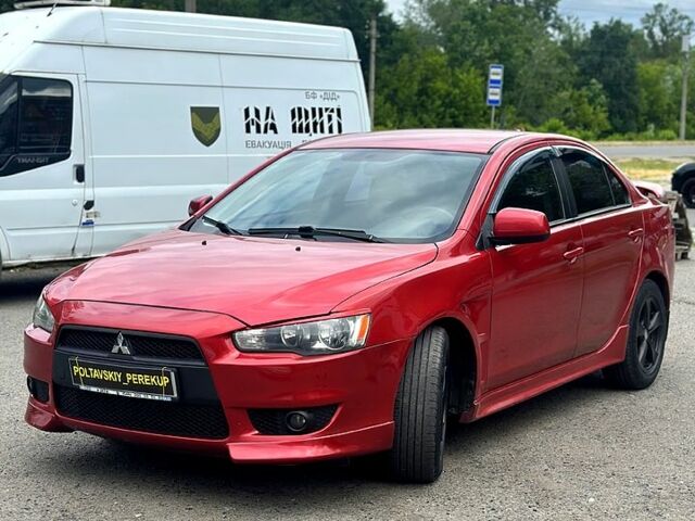 Червоний Міцубісі Lancer, об'ємом двигуна 2 л та пробігом 184 тис. км за 5999 $, фото 1 на Automoto.ua
