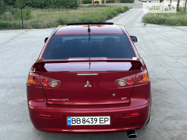 Червоний Міцубісі Lancer, об'ємом двигуна 2 л та пробігом 250 тис. км за 6500 $, фото 13 на Automoto.ua