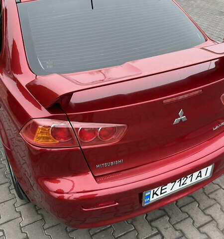 Красный Мицубиси Лансер, объемом двигателя 2 л и пробегом 261 тыс. км за 7200 $, фото 8 на Automoto.ua