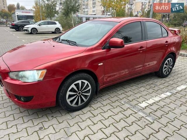 Красный Мицубиси Лансер, объемом двигателя 1.5 л и пробегом 207 тыс. км за 4500 $, фото 1 на Automoto.ua