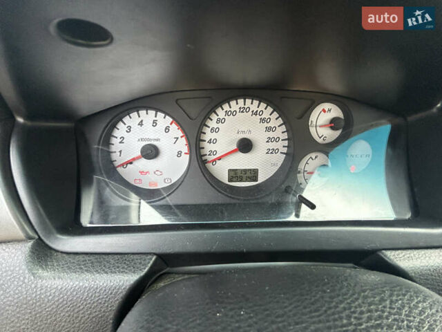 Красный Мицубиси Лансер, объемом двигателя 1.58 л и пробегом 280 тыс. км за 3250 $, фото 10 на Automoto.ua