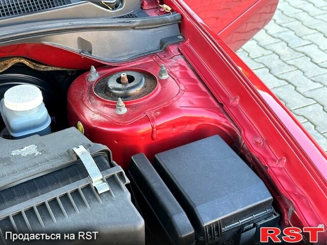 Червоний Міцубісі Lancer, об'ємом двигуна 1.6 л та пробігом 146 тис. км за 6900 $, фото 7 на Automoto.ua
