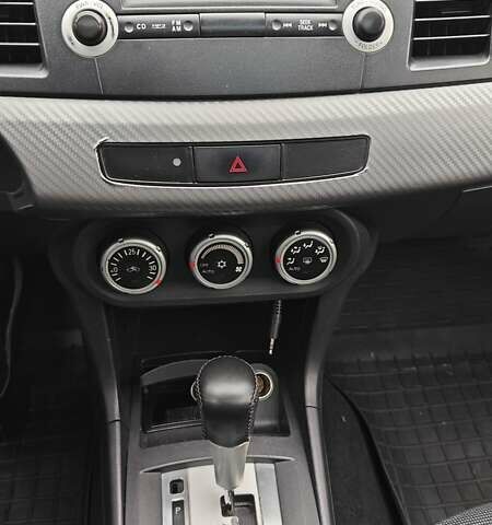 Червоний Міцубісі Lancer, об'ємом двигуна 2 л та пробігом 186 тис. км за 5600 $, фото 12 на Automoto.ua