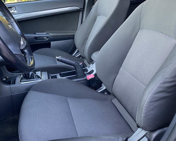 Червоний Міцубісі Lancer, об'ємом двигуна 2 л та пробігом 153 тис. км за 6700 $, фото 15 на Automoto.ua