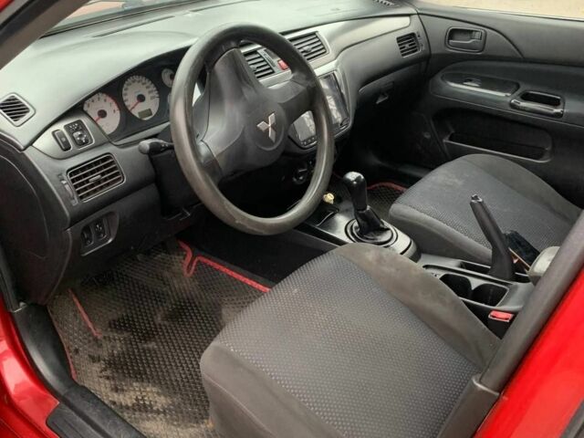 Червоний Міцубісі Lancer, об'ємом двигуна 1.6 л та пробігом 300 тис. км за 2799 $, фото 5 на Automoto.ua