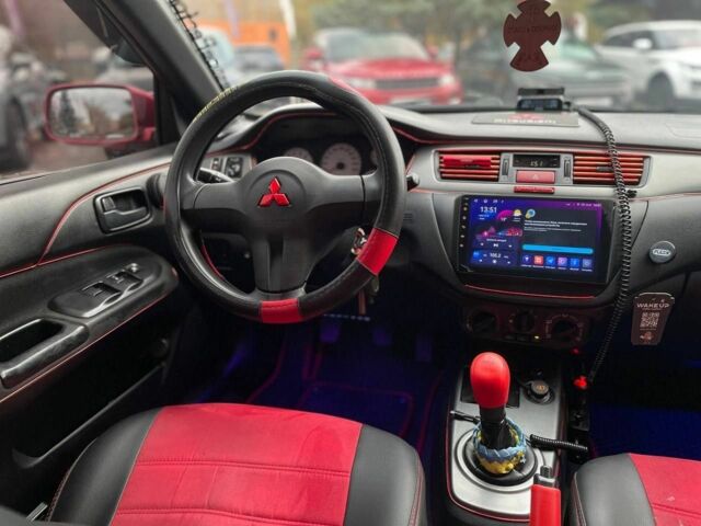 Мицубиси Лансер 2007 в Кривом Роге на Automoto.ua Красный Мицубиси Лансер, объемом двигателя 1.6 л и пробегом 252 тыс. км за 5400 $, фото 18 на Automoto.ua