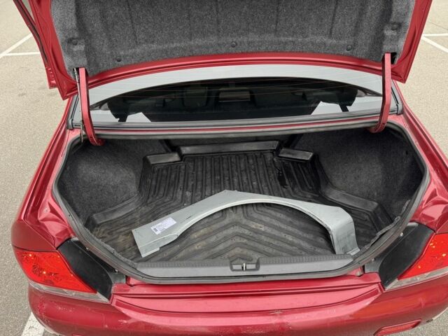 Красный Мицубиси Лансер, объемом двигателя 1.6 л и пробегом 285 тыс. км за 3650 $, фото 14 на Automoto.ua