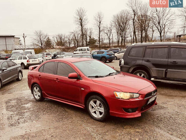 Міцубісі Lancer 2007 у Львові на Automoto.ua Червоний Міцубісі Lancer, об'ємом двигуна 2 л та пробігом 220 тис. км за 4300 $, фото 4 на Automoto.ua