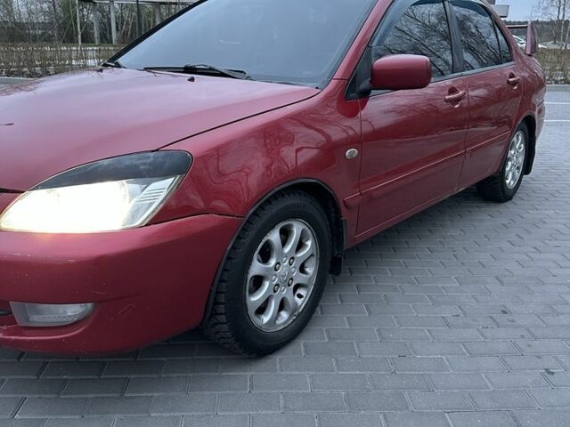 Червоний Міцубісі Lancer, об'ємом двигуна 1.6 л та пробігом 268 тис. км за 4800 $, фото 5 на Automoto.ua