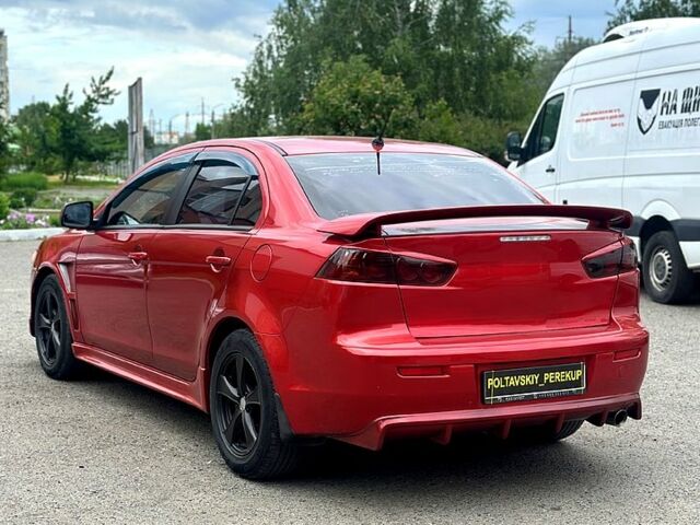 Червоний Міцубісі Lancer, об'ємом двигуна 2 л та пробігом 184 тис. км за 5999 $, фото 2 на Automoto.ua