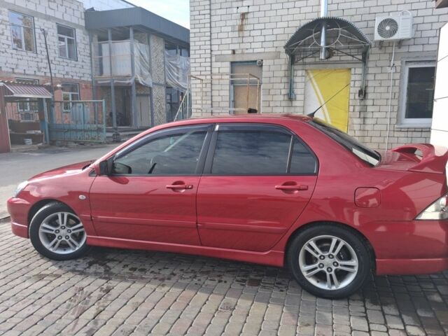 Мицубиси Лансер 2007 в Нежине на Automoto.ua Красный Мицубиси Лансер, объемом двигателя 2 л и пробегом 200 тыс. км за 5500 $, фото 2 на Automoto.ua