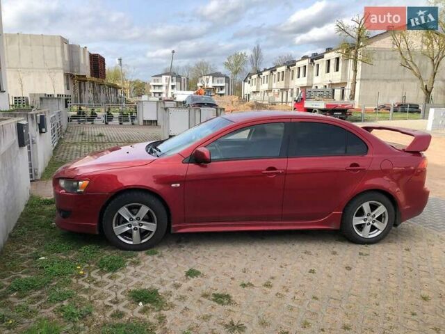 Красный Мицубиси Лансер, объемом двигателя 2 л и пробегом 198 тыс. км за 5700 $, фото 2 на Automoto.ua
