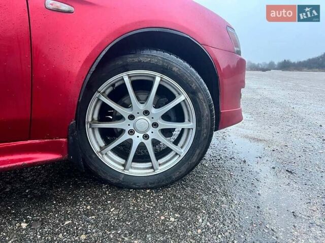 Красный Мицубиси Лансер, объемом двигателя 1.5 л и пробегом 241 тыс. км за 5850 $, фото 14 на Automoto.ua