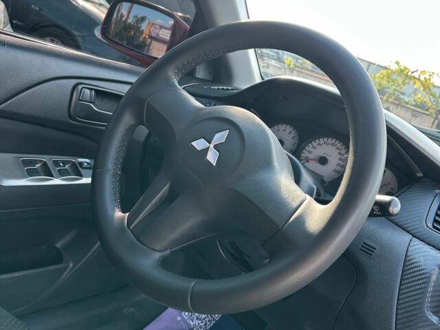 Красный Мицубиси Лансер, объемом двигателя 1.6 л и пробегом 230 тыс. км за 5300 $, фото 13 на Automoto.ua