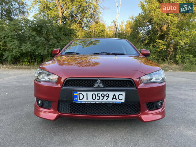 Червоний Міцубісі Lancer, об'ємом двигуна 2 л та пробігом 153 тис. км за 6700 $, фото 10 на Automoto.ua