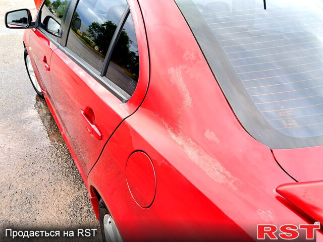 Червоний Міцубісі Lancer, об'ємом двигуна 2 л та пробігом 187 тис. км за 5000 $, фото 11 на Automoto.ua
