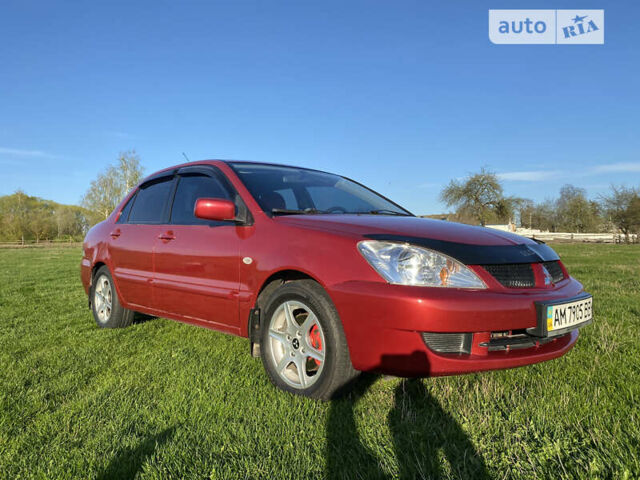 Червоний Міцубісі Lancer, об'ємом двигуна 1.6 л та пробігом 130 тис. км за 5800 $, фото 3 на Automoto.ua