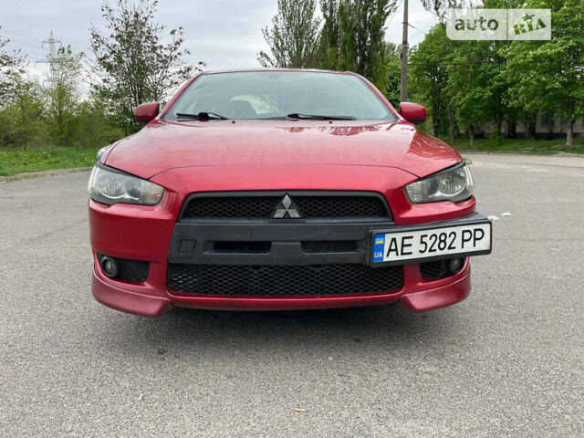 Червоний Міцубісі Lancer, об'ємом двигуна 2 л та пробігом 175 тис. км за 7000 $, фото 1 на Automoto.ua