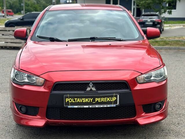 Червоний Міцубісі Lancer, об'ємом двигуна 2 л та пробігом 184 тис. км за 5999 $, фото 5 на Automoto.ua