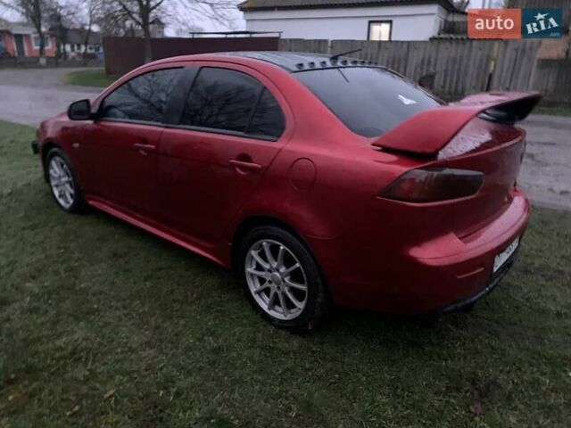 Красный Мицубиси Лансер, объемом двигателя 1.5 л и пробегом 241 тыс. км за 5850 $, фото 22 на Automoto.ua