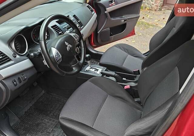 Міцубісі Lancer 2007 у Києві на Automoto.ua Червоний Міцубісі Lancer, об'ємом двигуна 2 л та пробігом 186 тис. км за 5600 $, фото 15 на Automoto.ua