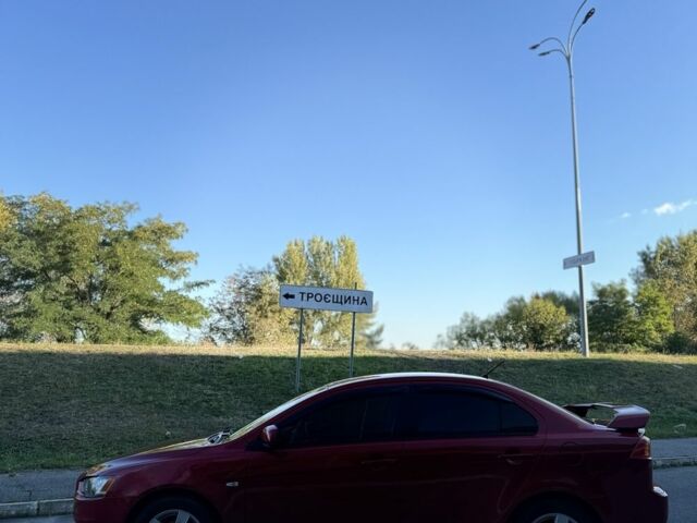 Красный Мицубиси Лансер, объемом двигателя 2 л и пробегом 307 тыс. км за 6499 $, фото 2 на Automoto.ua