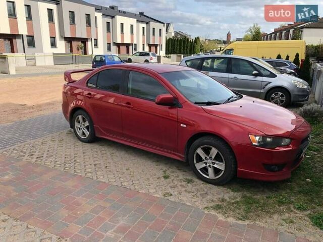 Красный Мицубиси Лансер, объемом двигателя 2 л и пробегом 198 тыс. км за 5700 $, фото 4 на Automoto.ua