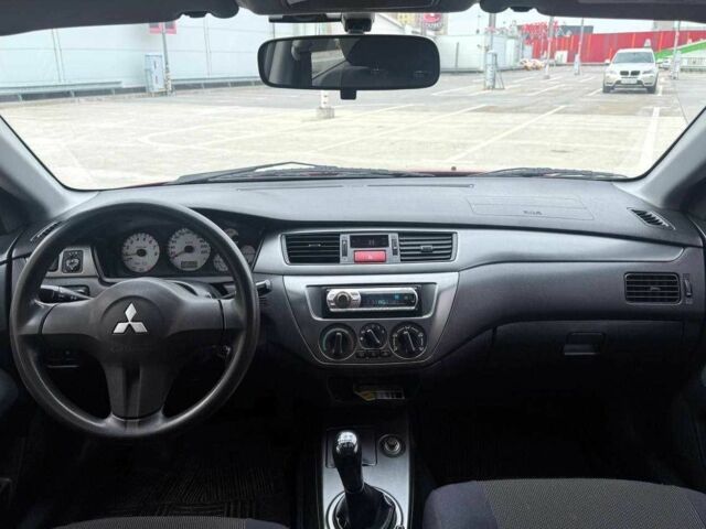 Мицубиси Лансер 2007 в Киеве на Automoto.ua Красный Мицубиси Лансер, объемом двигателя 1.6 л и пробегом 212 тыс. км за 5490 $, фото 11 на Automoto.ua