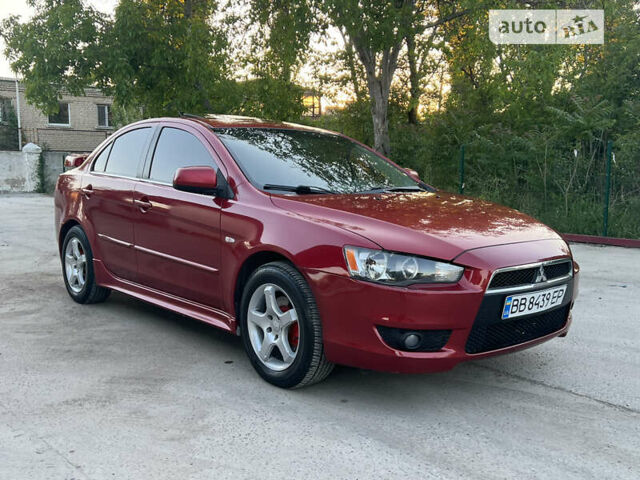 Червоний Міцубісі Lancer, об'ємом двигуна 2 л та пробігом 250 тис. км за 6500 $, фото 15 на Automoto.ua