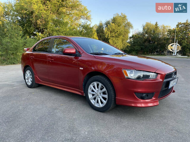 Червоний Міцубісі Lancer, об'ємом двигуна 2 л та пробігом 153 тис. км за 6700 $, фото 8 на Automoto.ua