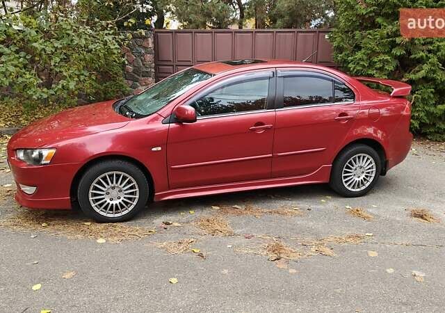 Міцубісі Lancer 2007 у Києві на Automoto.ua Червоний Міцубісі Lancer, об'ємом двигуна 2 л та пробігом 186 тис. км за 5600 $, фото 10 на Automoto.ua