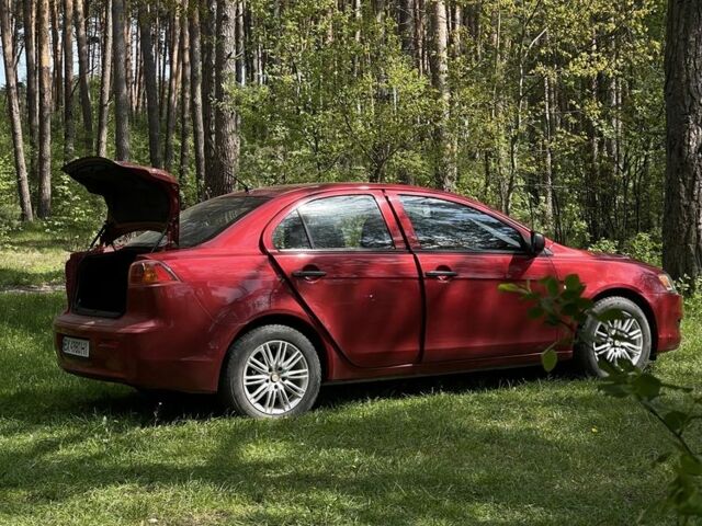 Червоний Міцубісі Lancer, об'ємом двигуна 1.5 л та пробігом 214 тис. км за 6150 $, фото 10 на Automoto.ua