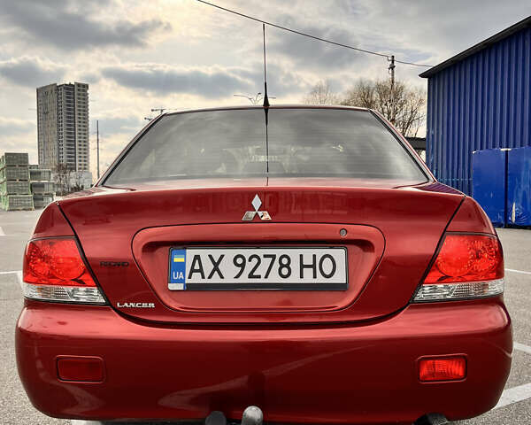 Червоний Міцубісі Lancer, об'ємом двигуна 1.6 л та пробігом 194 тис. км за 5500 $, фото 18 на Automoto.ua
