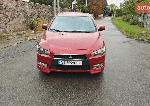 Червоний Міцубісі Lancer, об'ємом двигуна 2 л та пробігом 186 тис. км за 5600 $, фото 5 на Automoto.ua
