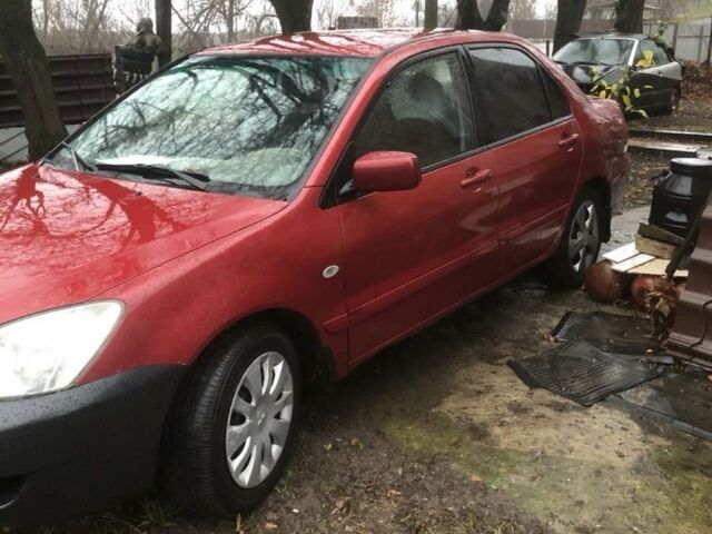 Червоний Міцубісі Lancer, об'ємом двигуна 1.6 л та пробігом 286 тис. км за 3450 $, фото 2 на Automoto.ua